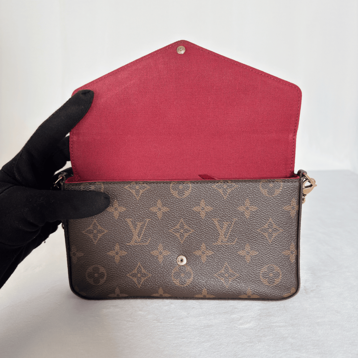 LOUIS VUITTON - POCHETTE FÉLICIE - TOILE MONOGRAM - DOUBLURE FUCHSIA