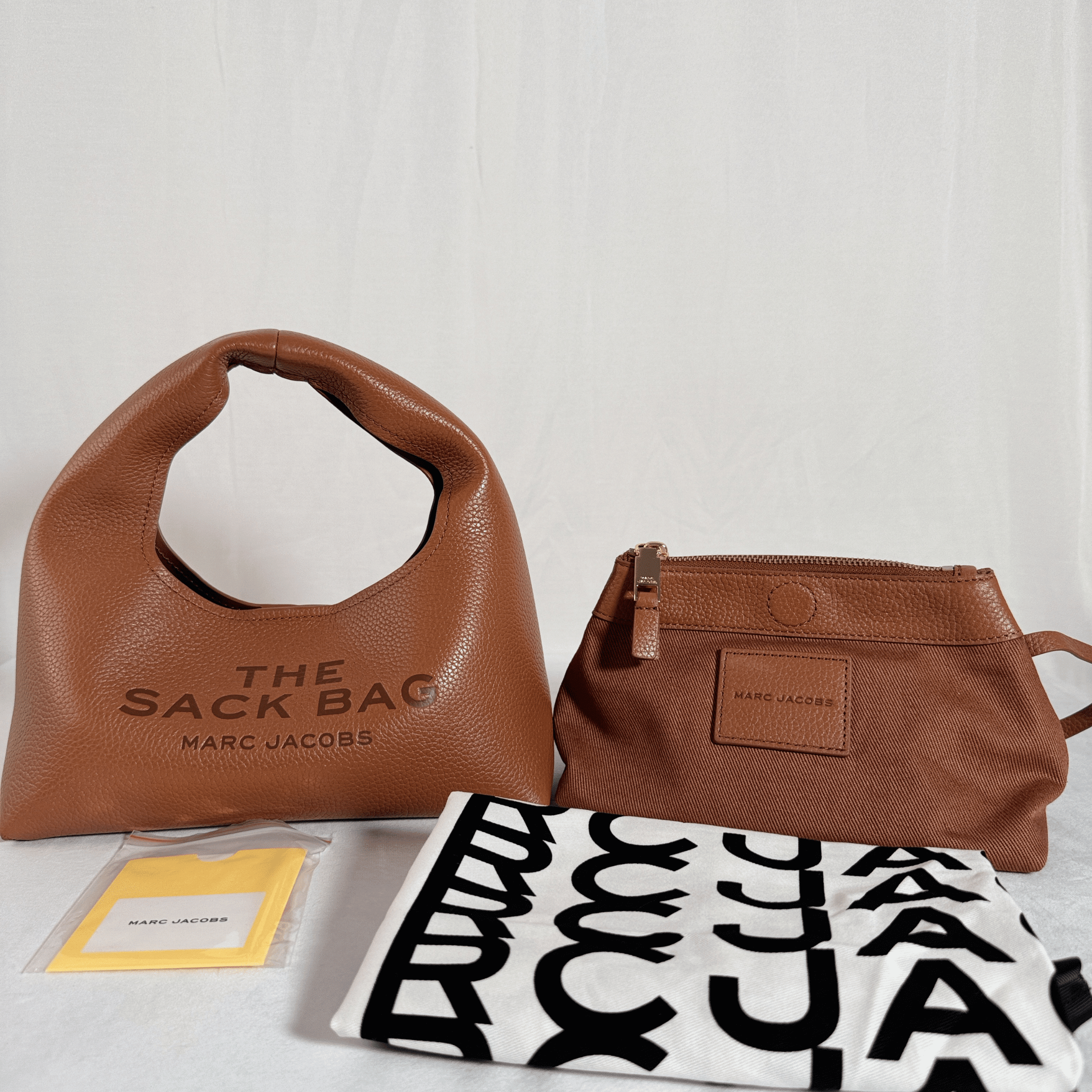 SAC MARC JACOBS THE MINI SACK BAG - CUIR GRAINE CAMEL - La Belle Boutique