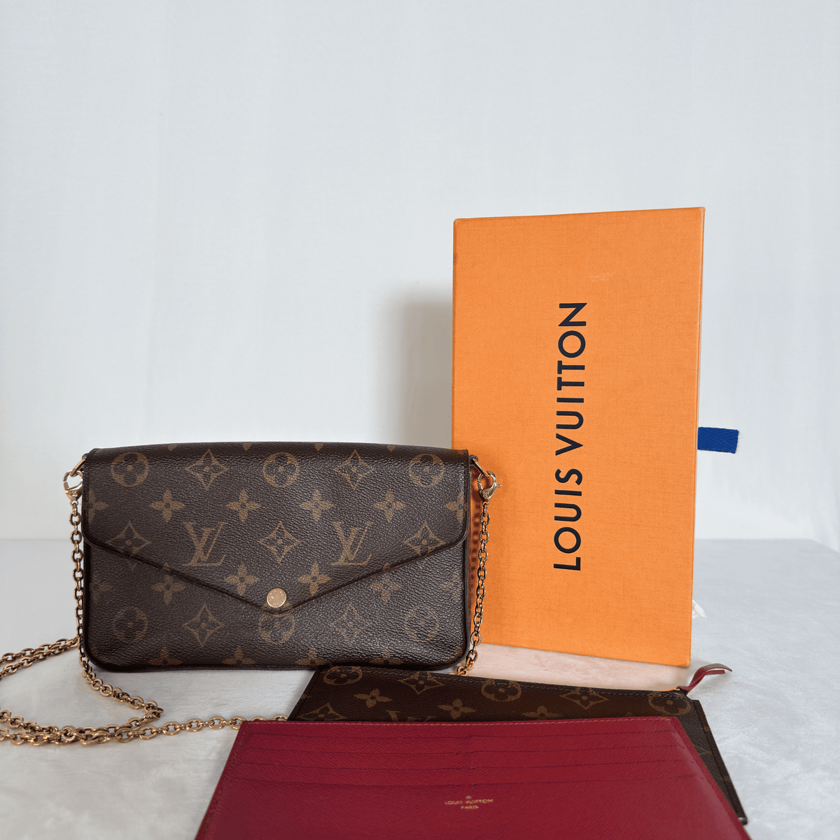 LOUIS VUITTON - POCHETTE FÉLICIE - TOILE MONOGRAM - DOUBLURE FUCHSIA