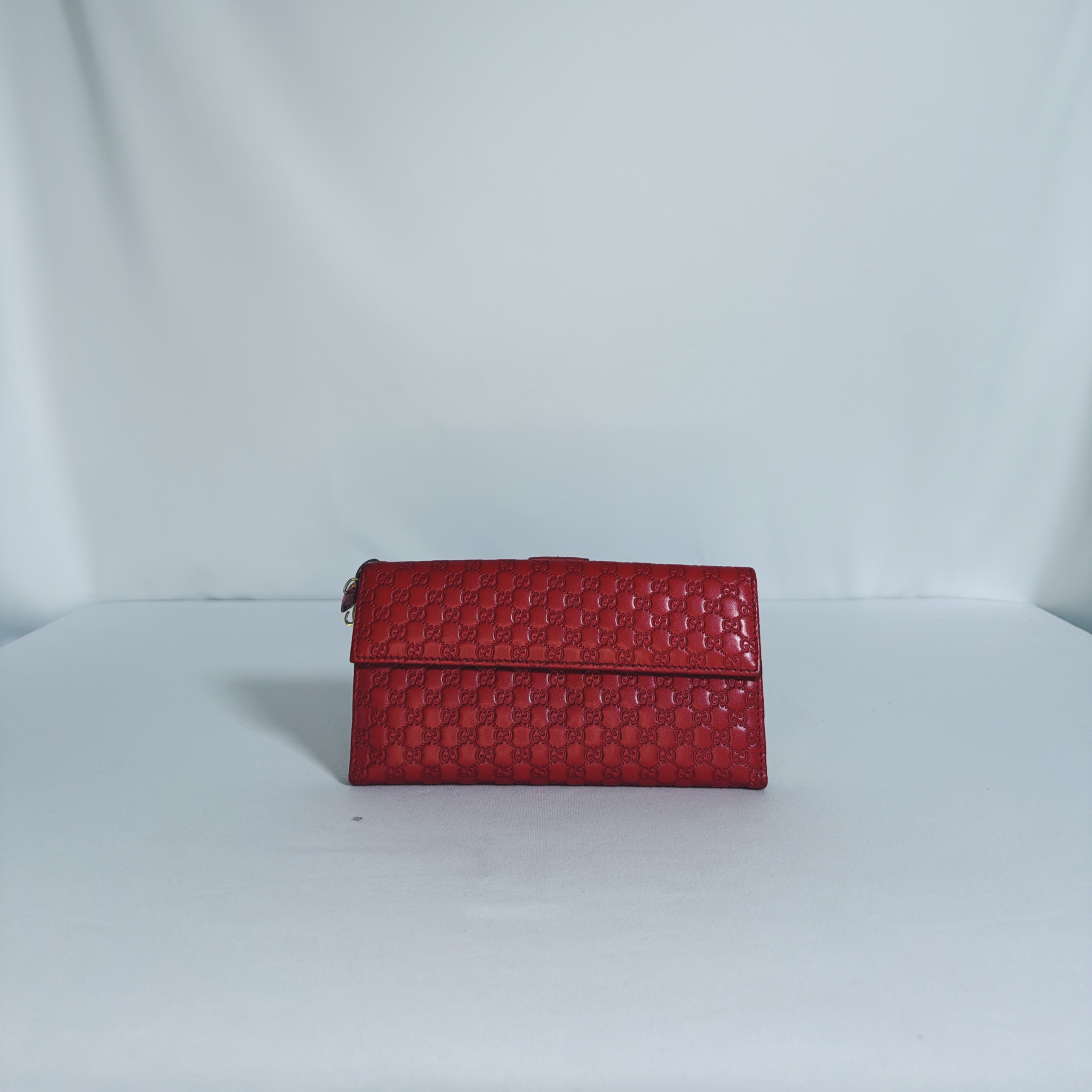 Pochette/ Portefeuille Gucci Guccissima rouge