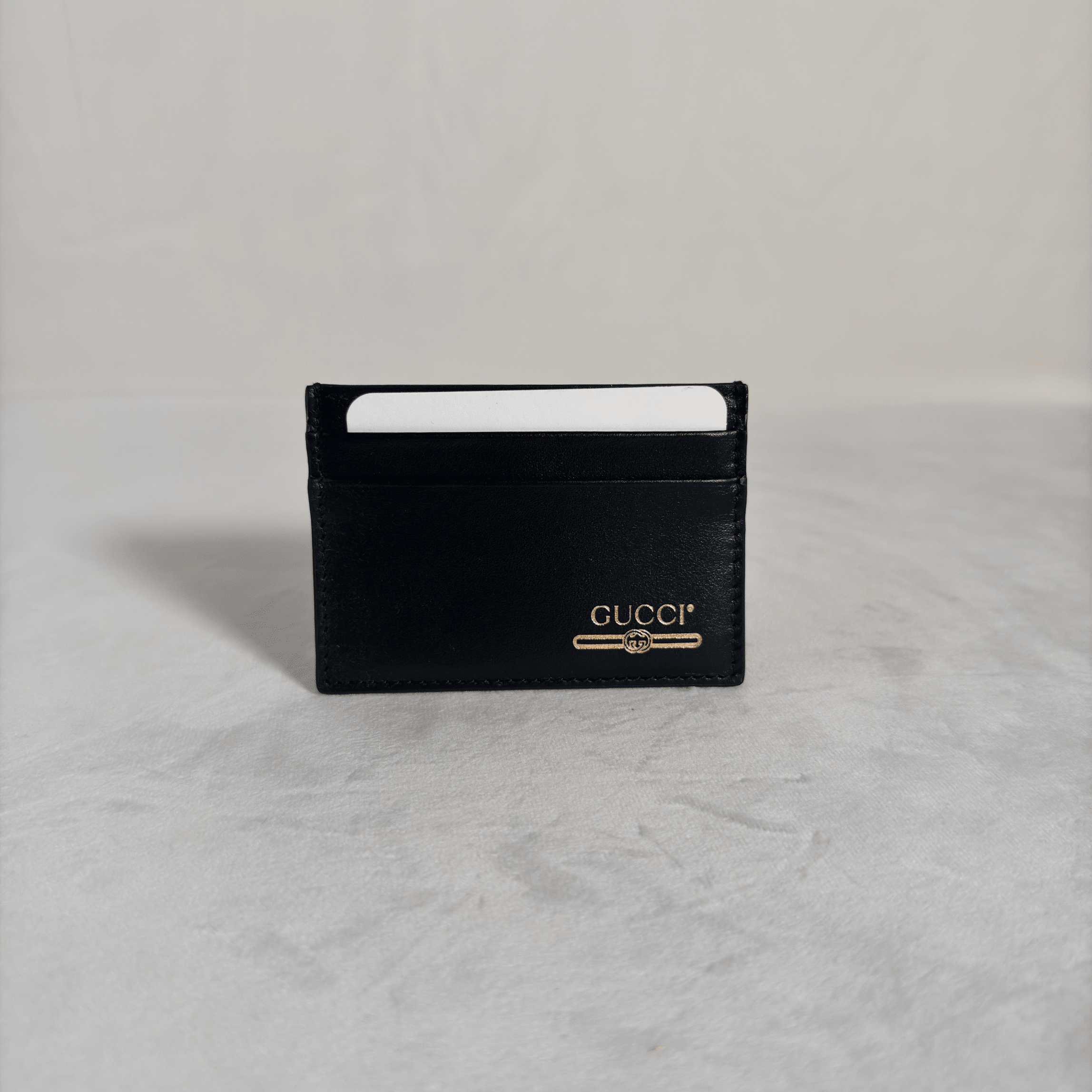 PORTE - CARTE GUCCI - CUIR LISSE NOIR - LOGO DORE - La Belle Boutique