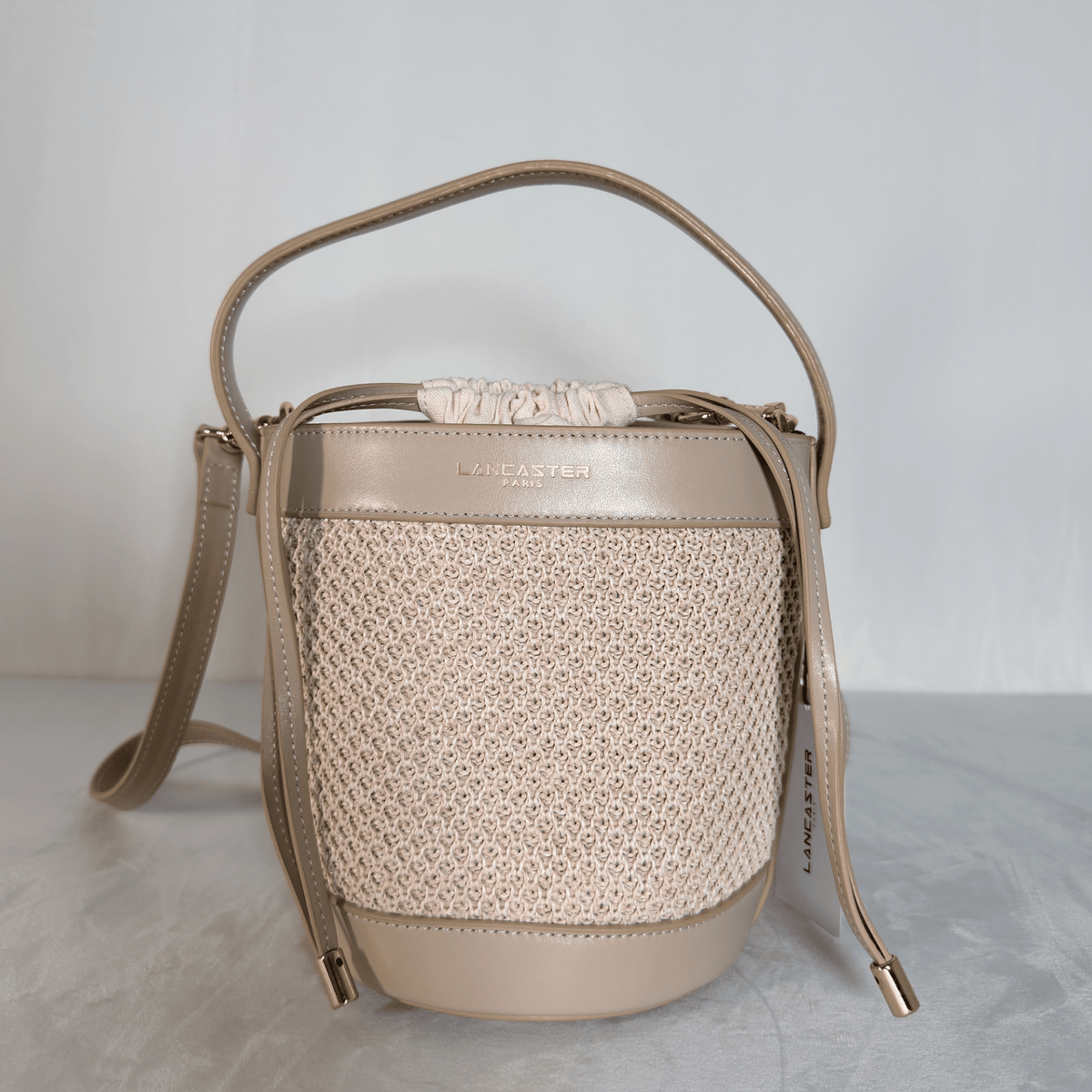 LANCASTER - SAC SEAU SO OSIER - CUIR ET EFFET RAPHIA IVOIRE - BANDOULIERE AMOVIBLE