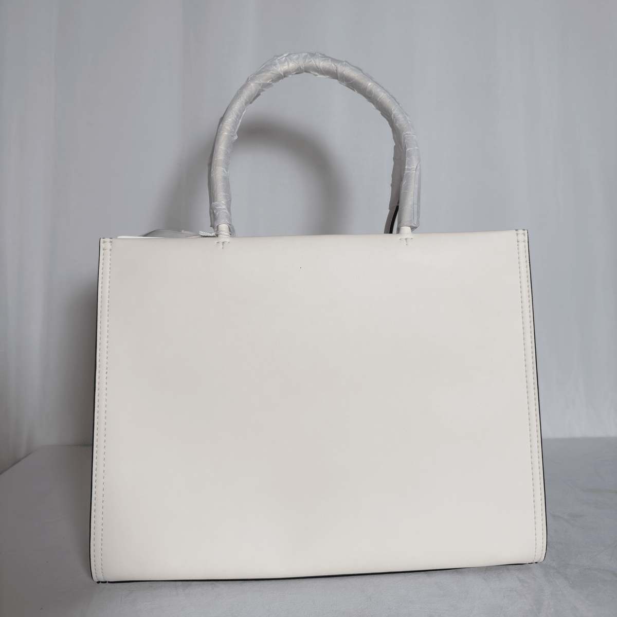 TORY BURCH - SAC TOTE ELLA BIO - CUIR VEGAN IVOIRE / LOGO ROND RELIEF - La Belle Boutique