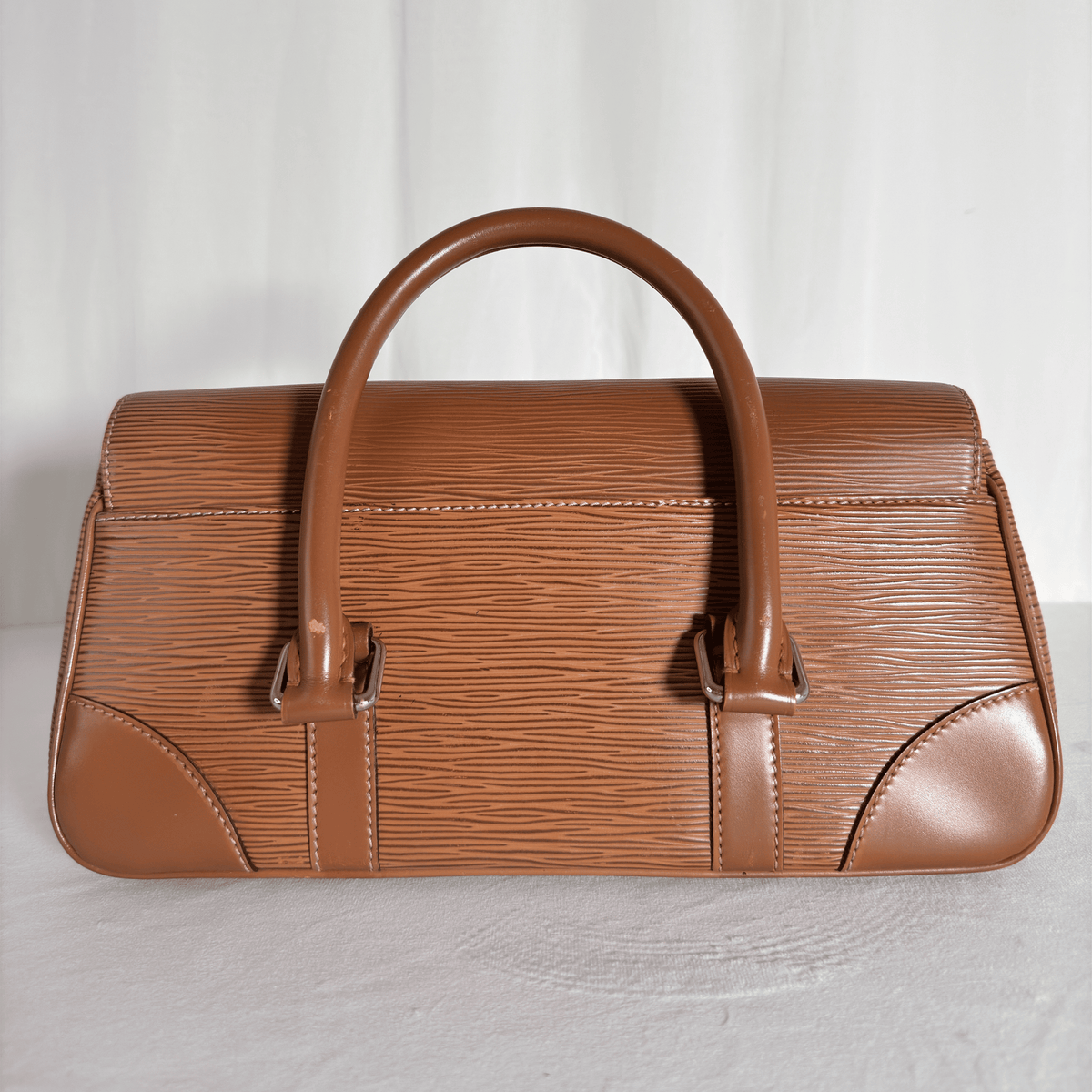LOUIS VUITTON - SAC À MAIN SEGUR PM - CUIR ÉPI CANNELLE - La Belle Boutique
