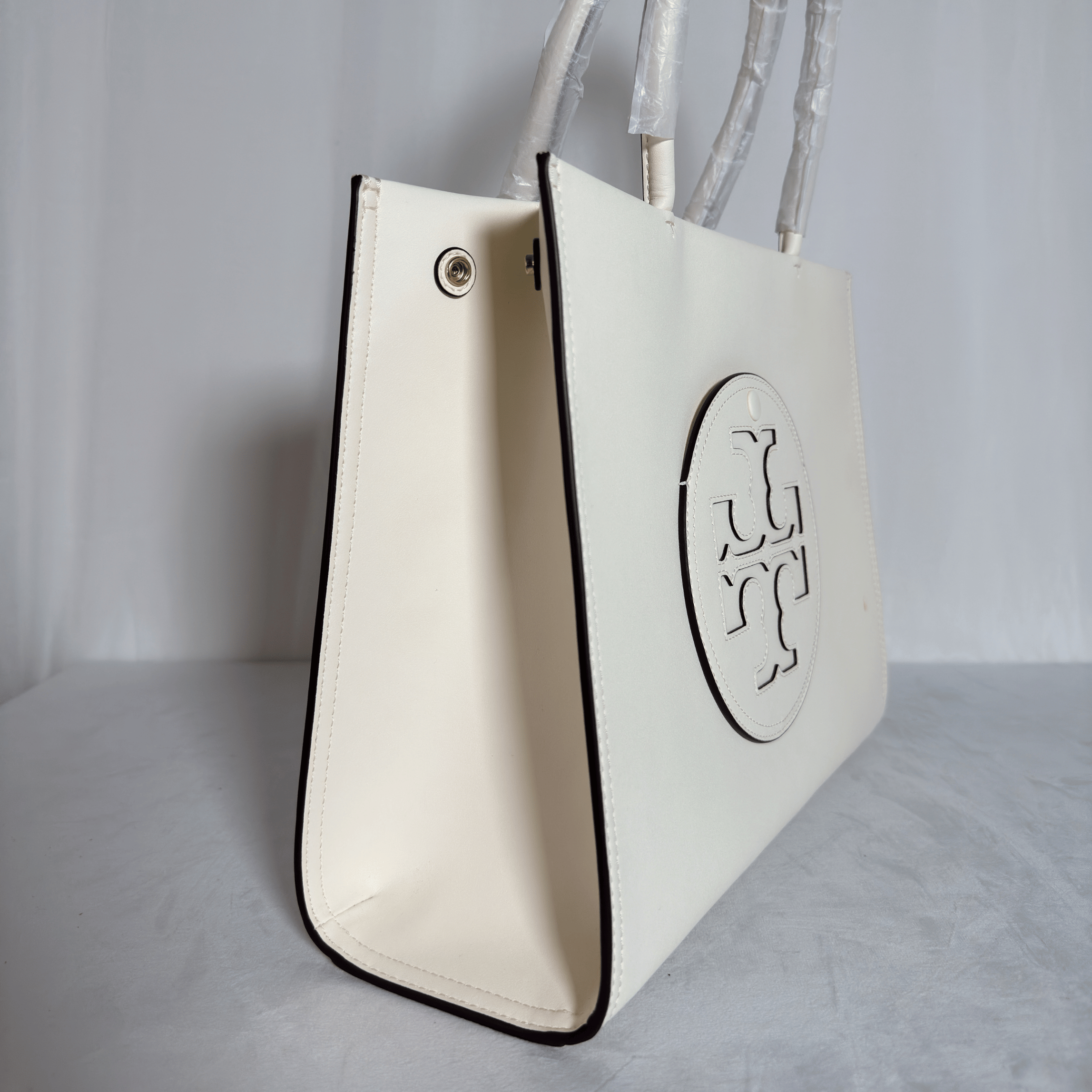 TORY BURCH - SAC TOTE ELLA BIO - CUIR VEGAN IVOIRE / LOGO ROND RELIEF