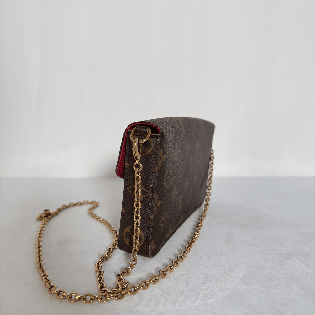 LOUIS VUITTON - POCHETTE FÉLICIE - TOILE MONOGRAM - DOUBLURE FUCHSIA
