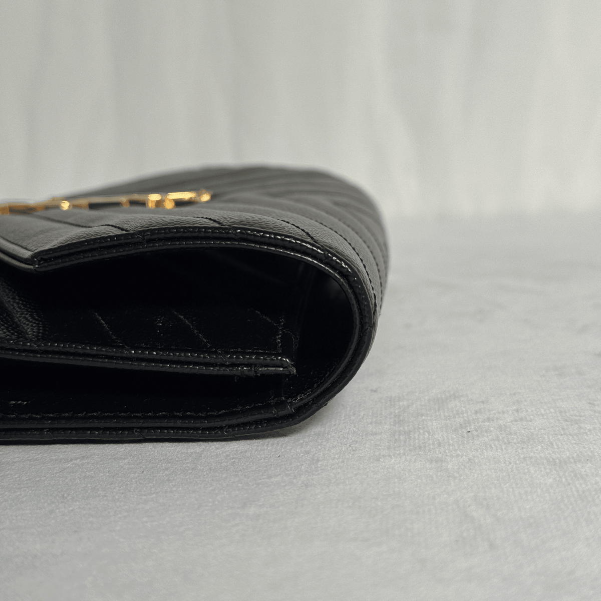 SAINT LAURENT - POCHETTE CASSANDRE MATELASSÉ - CUIR GRAIN DE POUDRE NOIR - La Belle Boutique