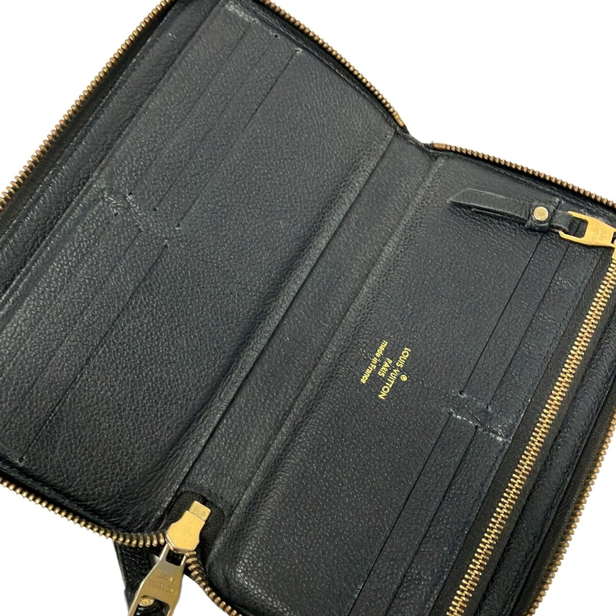 LOUIS VUITTON - PORTEFEUILLE ZIPPY - CUIR MONOGRAM EMPREINTE NOIR