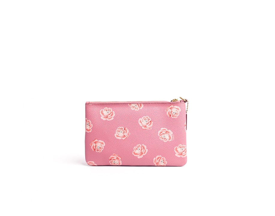Pochette fleurie cuir Coach