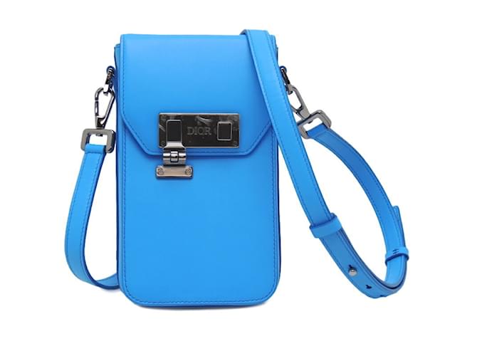 Pochette en cuir C. DIOR