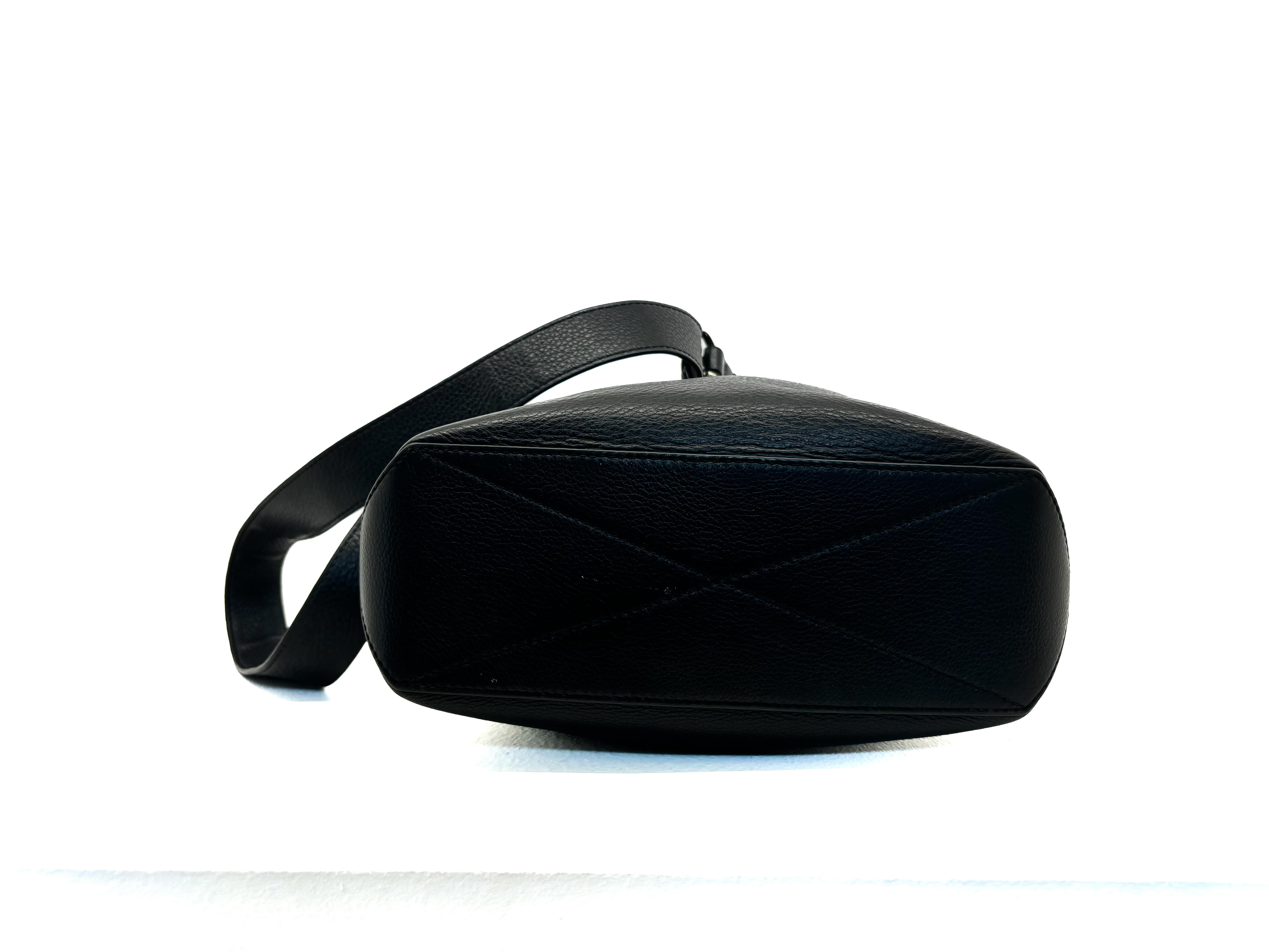 Sac bandoulière Sacha Lancel en cuir noir