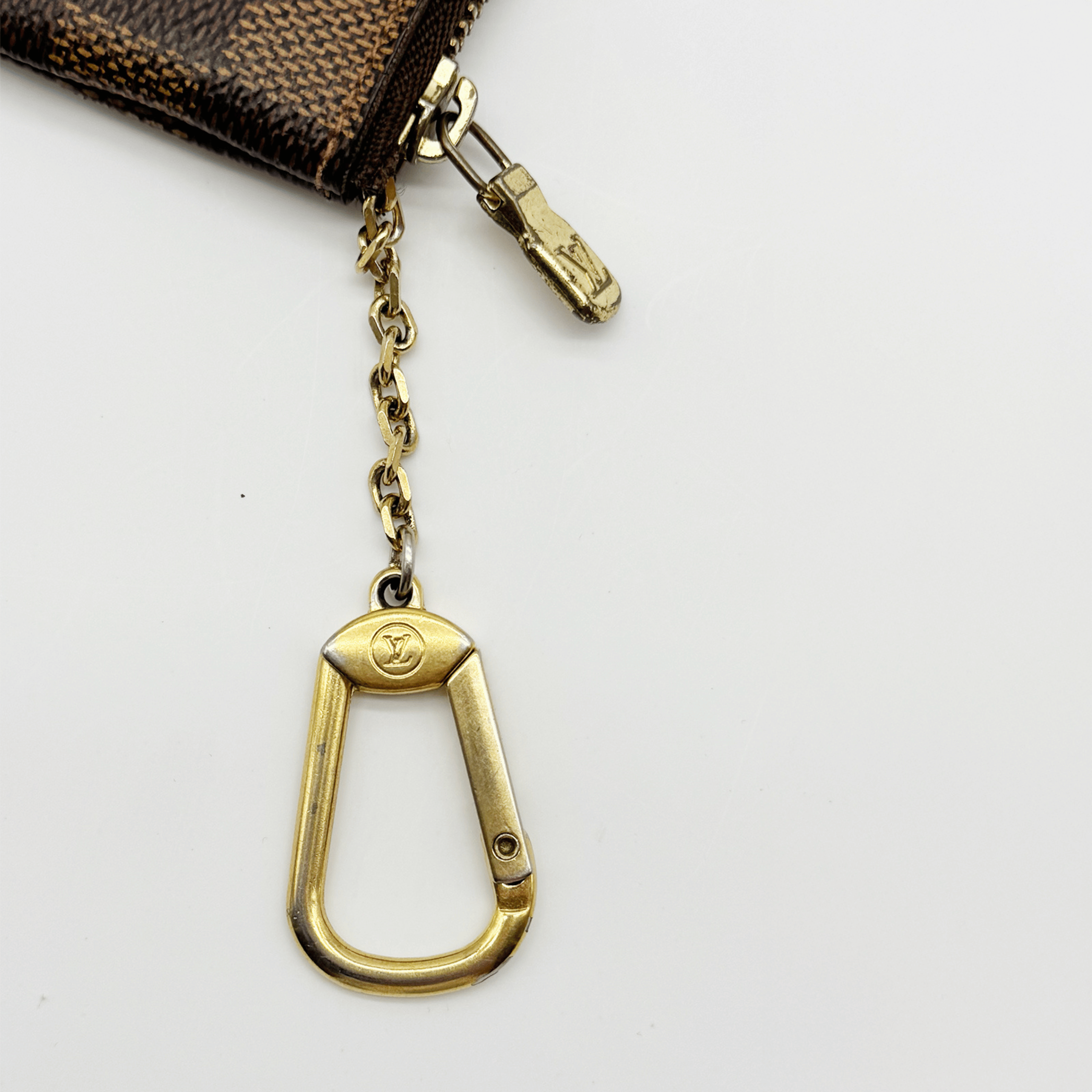 Louis Vuitton Pochette Clés Damier Ébène très bon état authentifiée - La Belle Boutique
