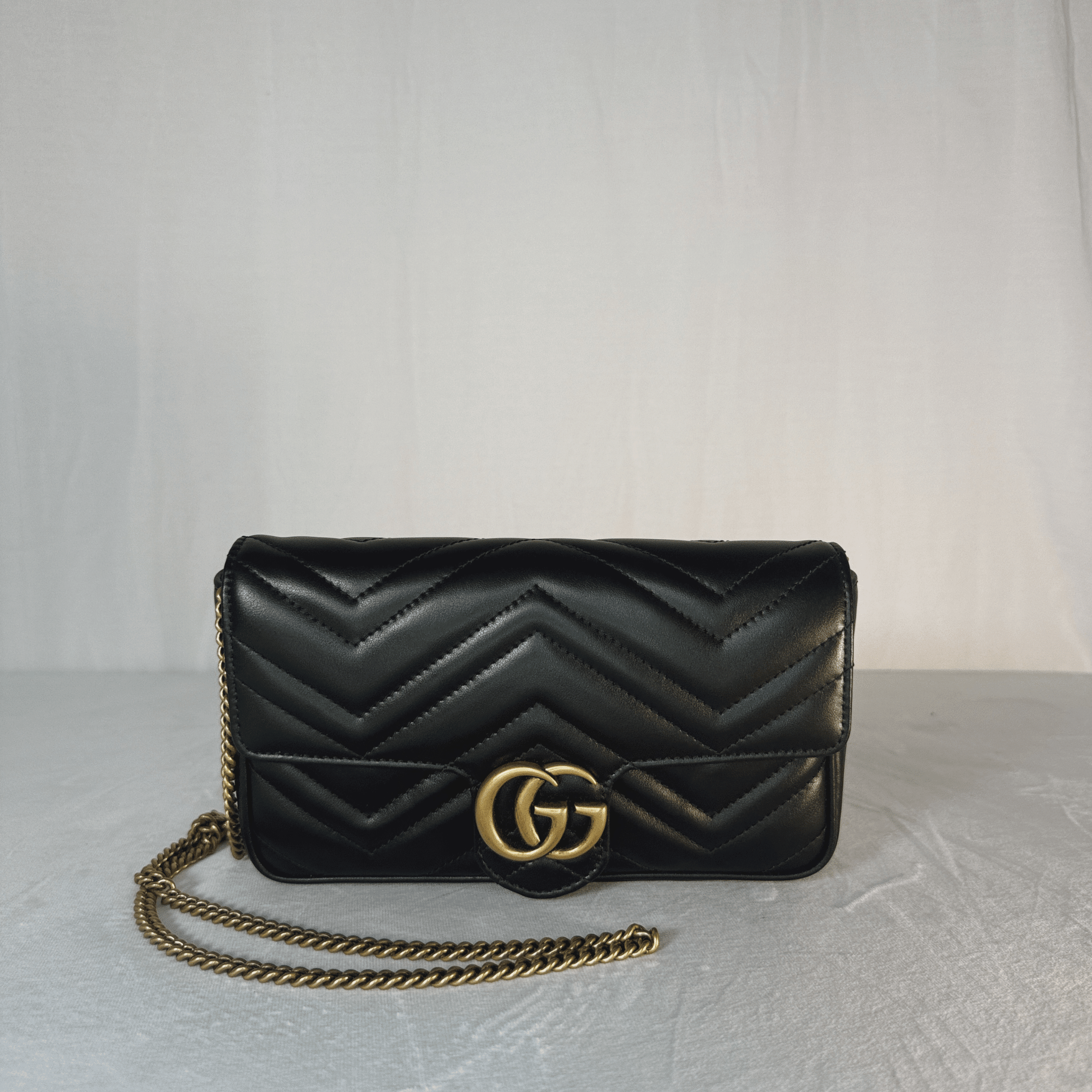 SAC GUCCI GG MARMONT MINI EN CUIR MATELASSÉ NOIR - La Belle Boutique