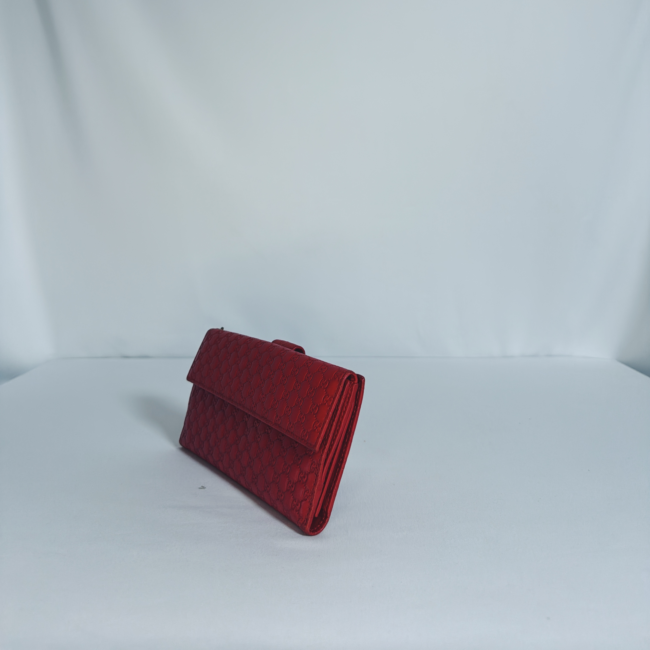 Pochette/ Portefeuille Gucci Guccissima rouge