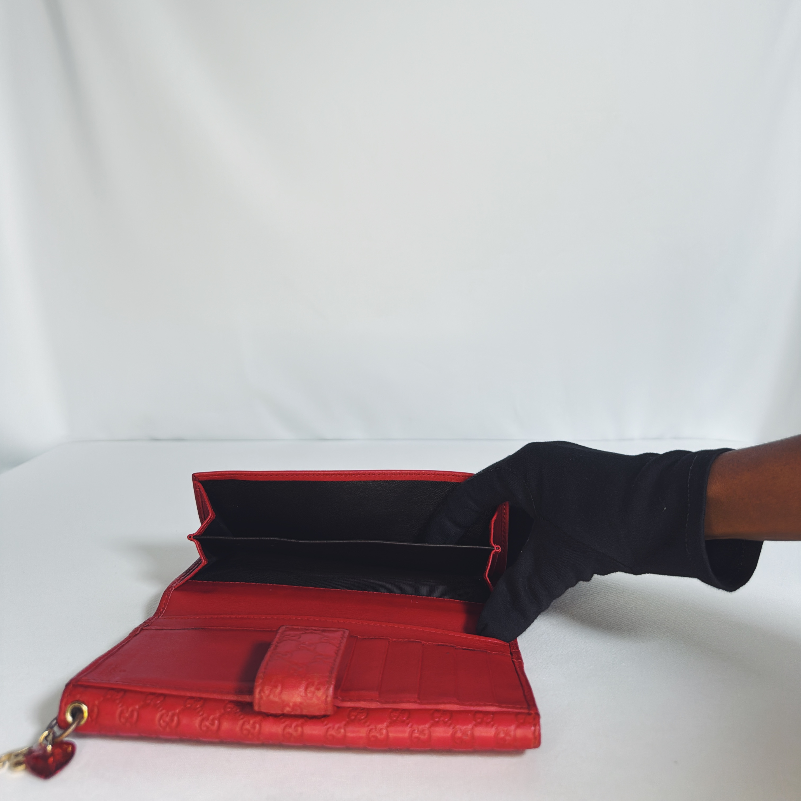 Pochette/ Portefeuille Gucci Guccissima rouge