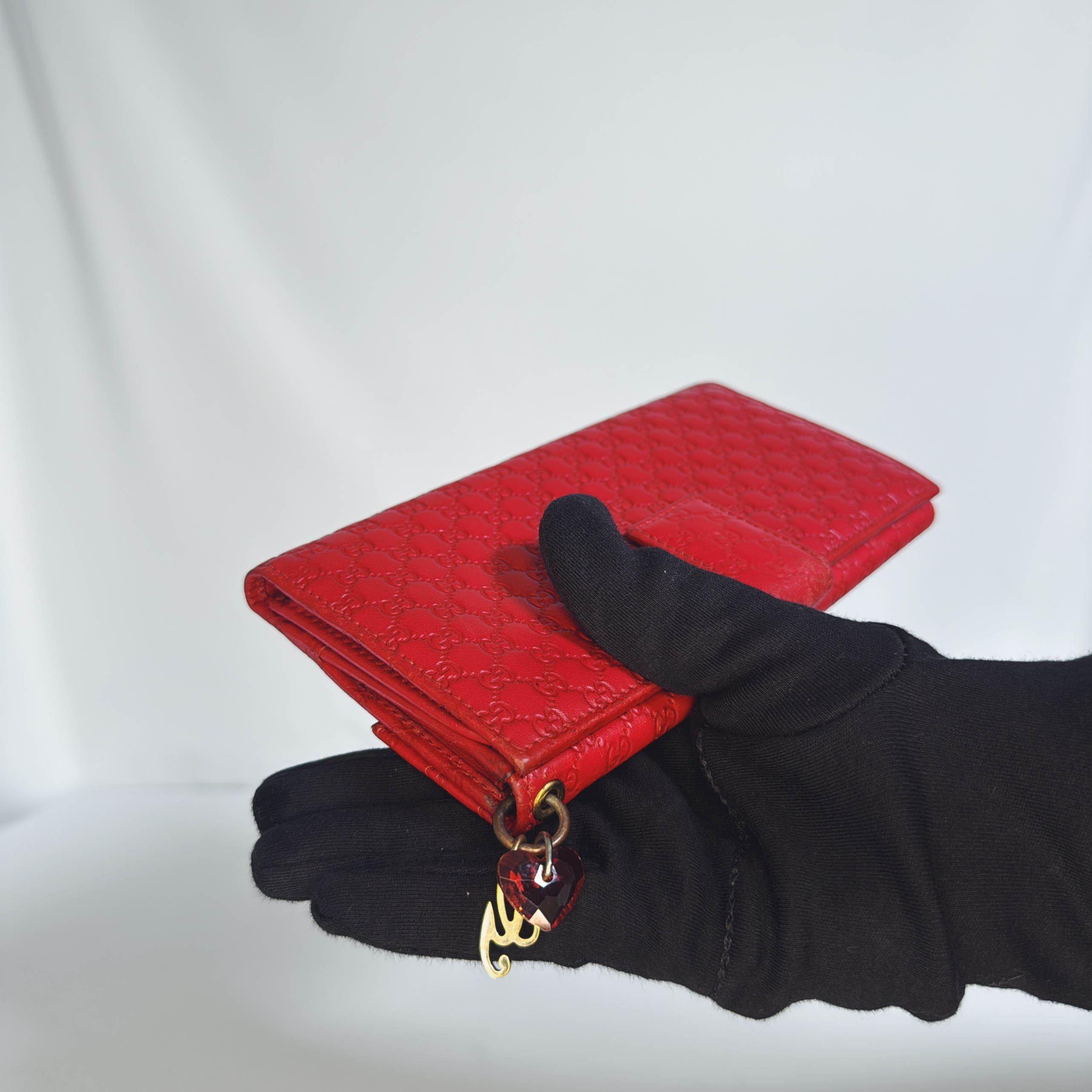 Pochette/ Portefeuille Gucci Guccissima rouge