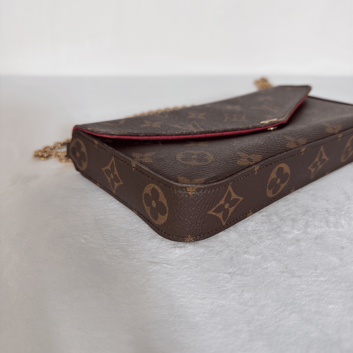 LOUIS VUITTON - POCHETTE FÉLICIE - TOILE MONOGRAM - DOUBLURE FUCHSIA