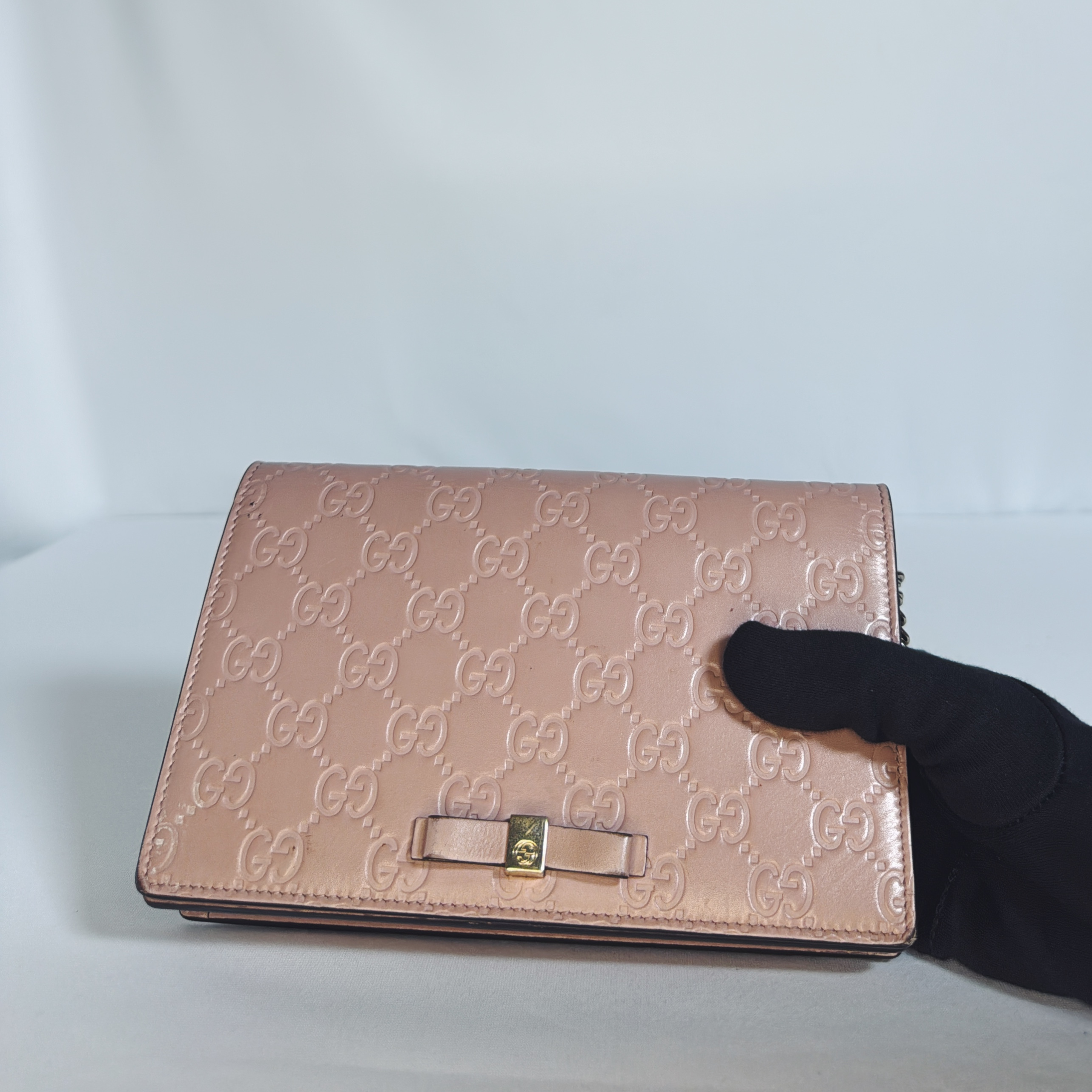 Pochette Wallet on Chain Gucci – Cuir embossé Guccissima rose nude