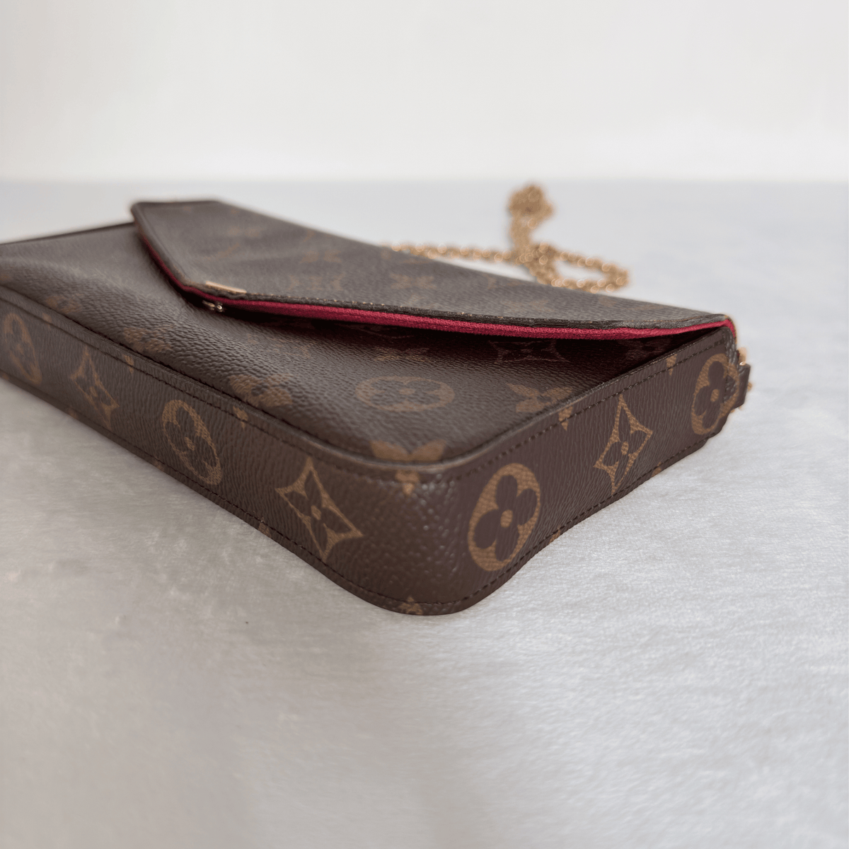 LOUIS VUITTON - POCHETTE FÉLICIE - TOILE MONOGRAM - DOUBLURE FUCHSIA
