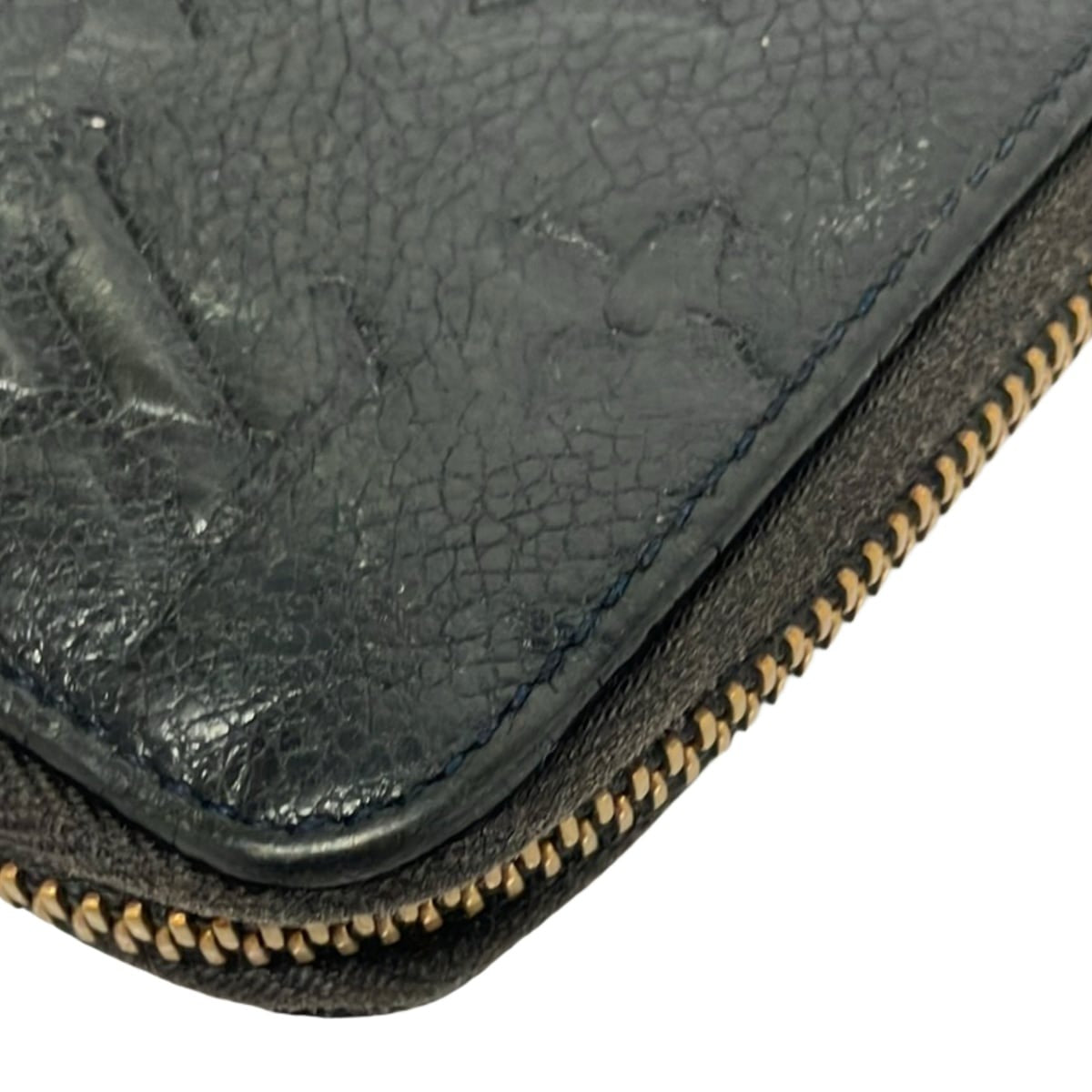 LOUIS VUITTON - PORTEFEUILLE  ZIPPY - CUIR MONOGRAM EMPREINTE NOIR