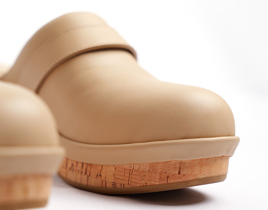 Beige leather clogs