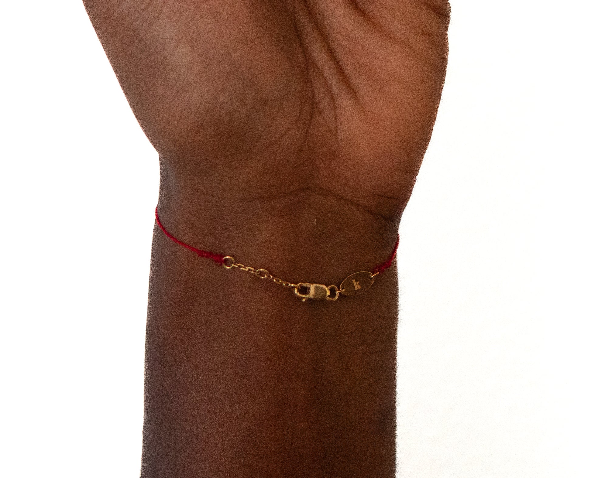 Détail du motif poisson diamants noirs et blancs du bracelet Redline Blup Blup