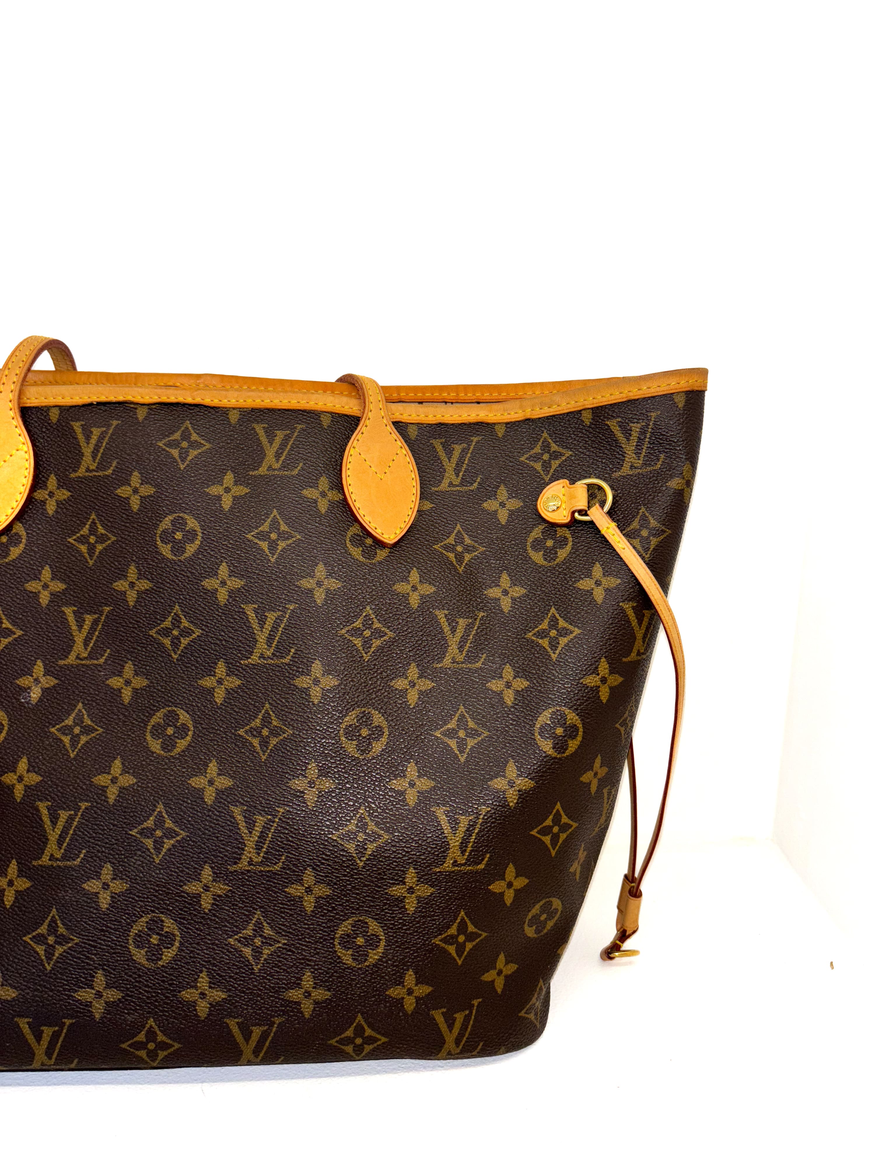 Sac à main Neverfull MM monogramme intérieur beige